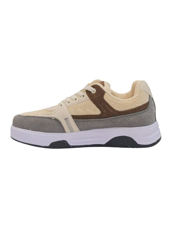 کفش کتونی ونس زارا طرح ZARA کرم قهوه ایI will provide 3 images of a sneaker from different angles. Using these images, generate a photorealistic render of a model wearing the exact same sneaker, making the sneaker the focal point of the scene. Requirements: Recreate the sneaker exactly as shown in the images (color, texture, patterns, sole design), ensuring the details are highly visible and clear. Place the shoes naturally on the model’s feet with correct perspective and realistic foot shape, emphasizing the sneakers. Adjust the lighting and shadows to highlight the shoes, making them stand out in the scene. The focus should be on making the sneakers the primary visual element. Model Styling: Choose the best outfit that complements the sneaker, but the outfit should not distract from the shoes. If the sneaker is sporty → style should be sporty/streetwear, but with a focus on showcasing the sneakers. If the sneaker is neutral/minimal → style should be clean and minimal, with less emphasis on the outfit. Colors of the outfit should harmonize with the sneaker, but the model’s posture and pose should direct attention to the shoes. Location: The model should be placed in an urban environment, such as a city street, alley, or an industrial background. Make sure the environment feels dynamic but not overpowering, with some elements like street art, buildings, or subtle architectural features. The lighting should be adapted to an outdoor setting (daylight, soft shadows, etc.) to blend the sneakers naturally with the urban backdrop. Pose and Angle: The model should be posed in a way that the sneakers are clearly visible and accentuated (e.g., standing on a street corner, walking along a sidewalk, or posing against a graffiti wall). Full-body model in an urban location with soft, natural lighting that focuses on the shoes. Output: High-quality, full-body model with the sneakers prominently visible, set against a stylish urban backdrop, perfect for online shops or advertising. The render should look like a natural, commercial-grade product-on-foot visualization with the sneakers as the center of attention, seamlessly integrated into the city environment.